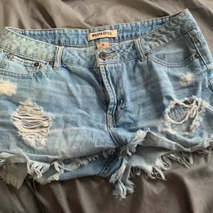 Light blue ripped denim shorts